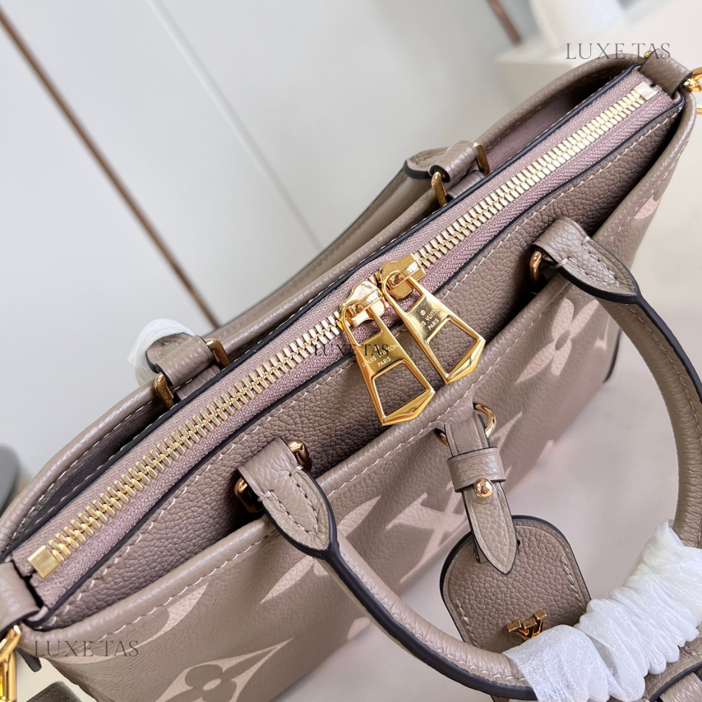 Bicolor Monogram Empreinte Leather Trianon PM - Leather Handbag for Women