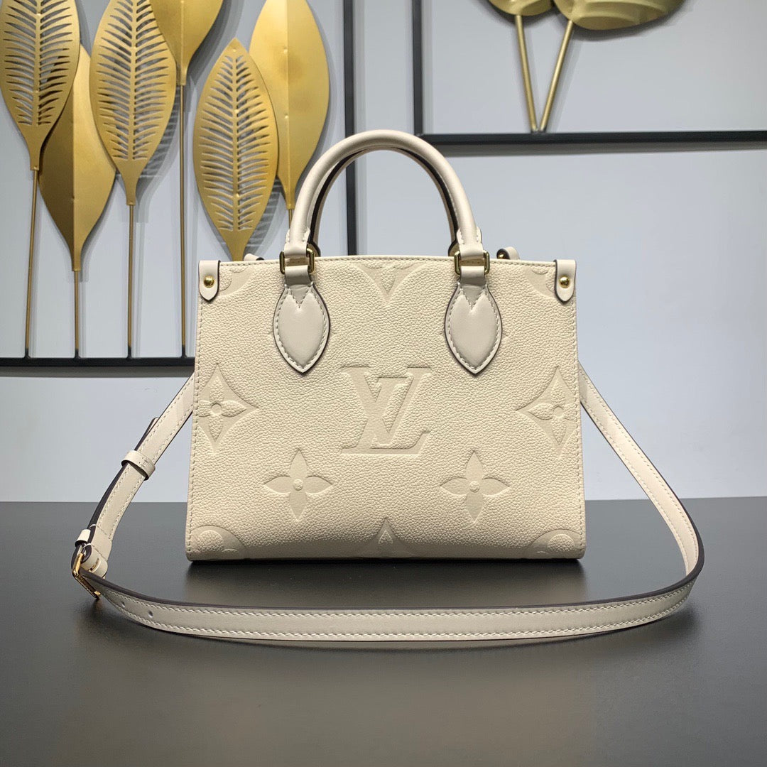 Cream Monogram Empreinte Leather OnTheGo PM - Leather Tote Bag for Women