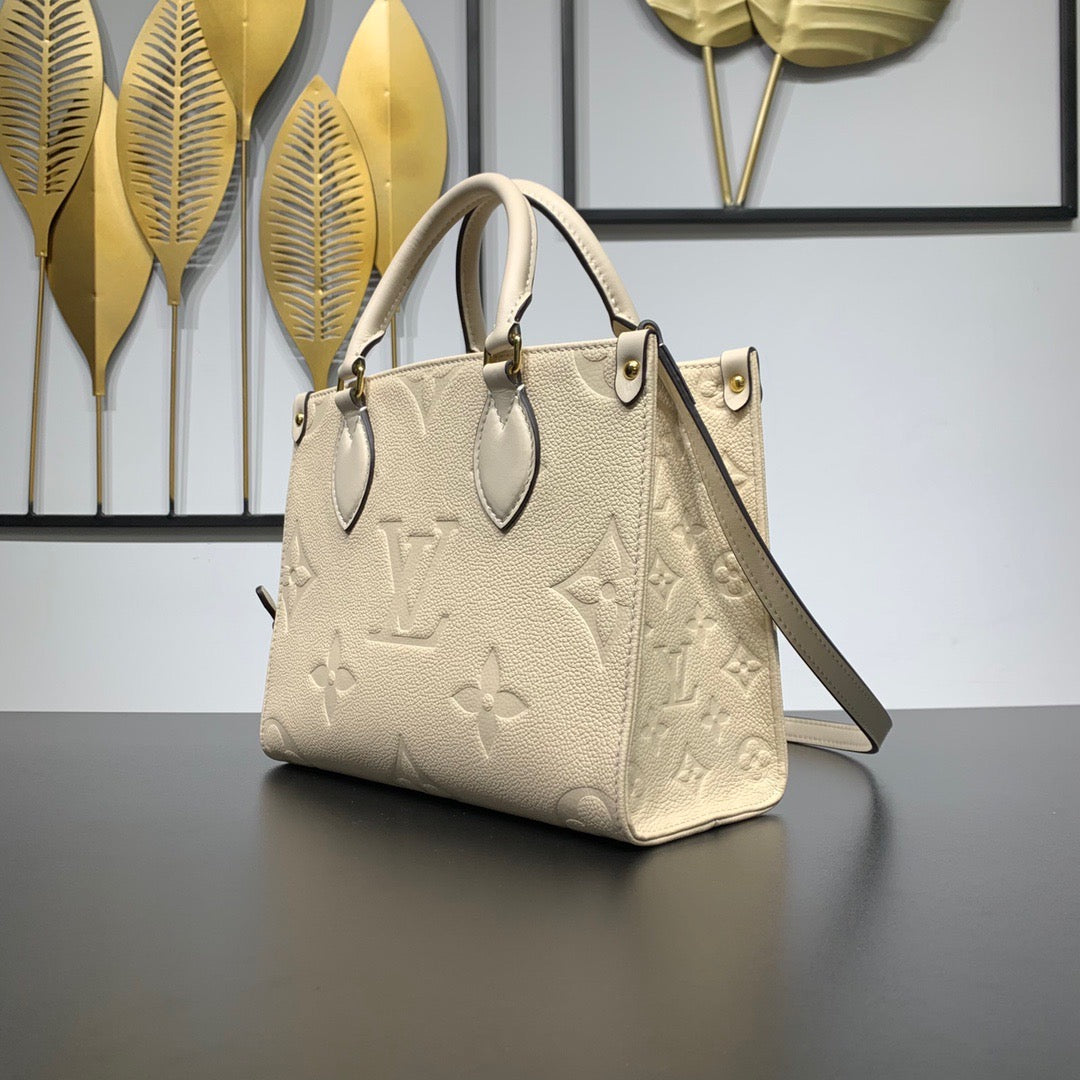 Cream Monogram Empreinte Leather OnTheGo PM - Leather Tote Bag for Women