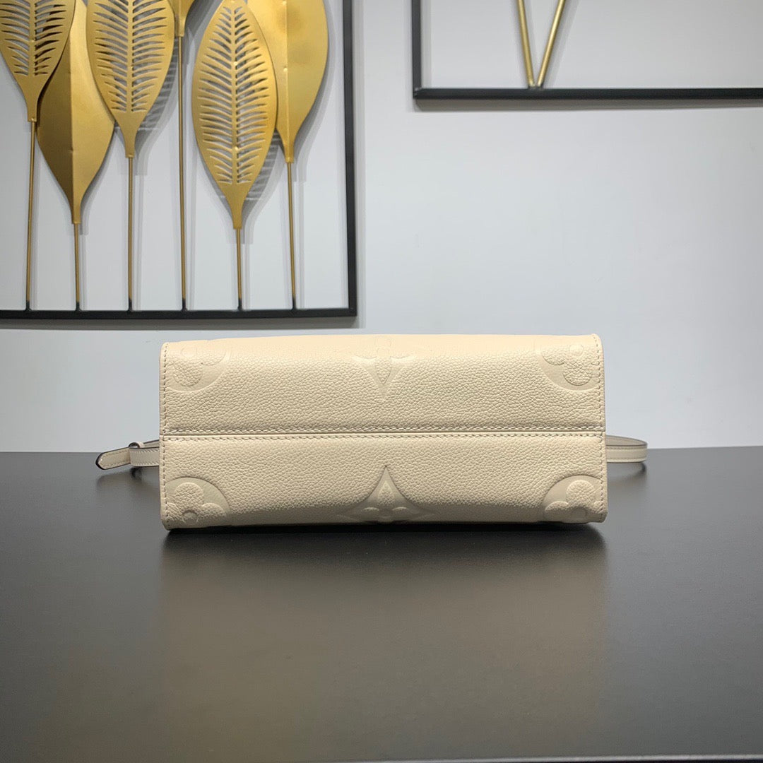 Cream Monogram Empreinte Leather OnTheGo PM - Leather Tote Bag for Women