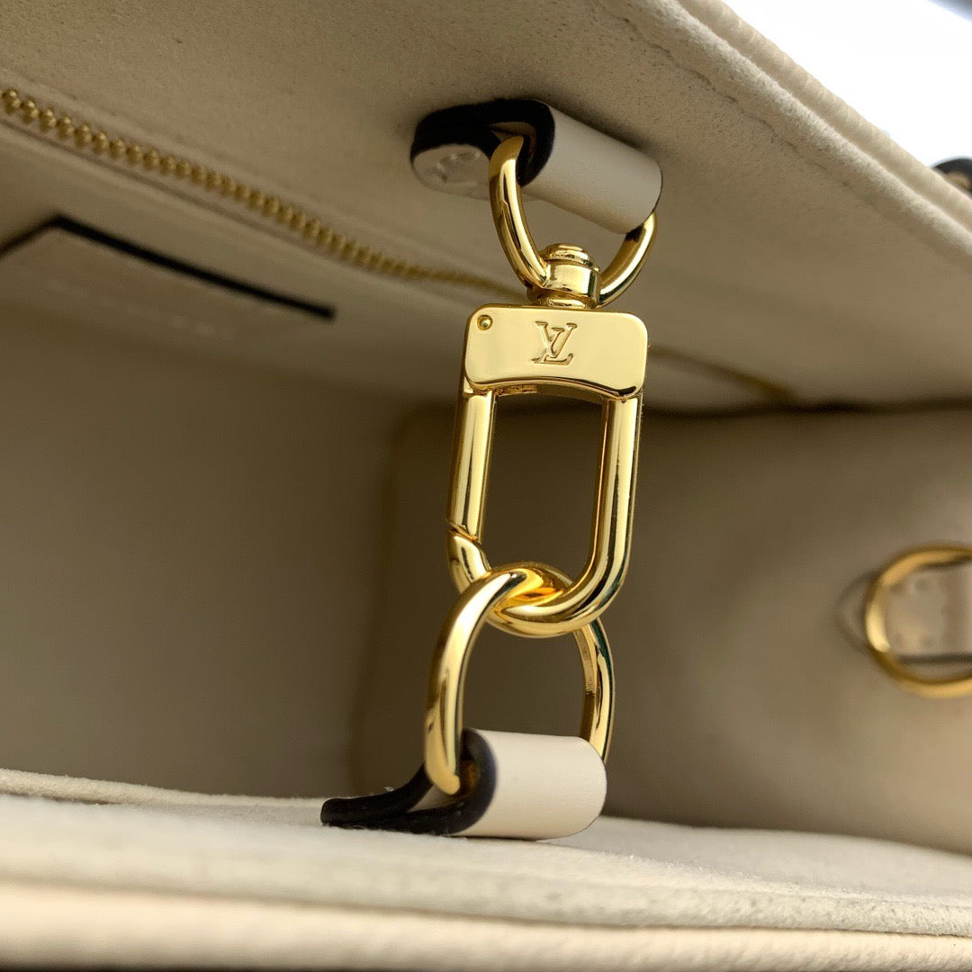 Cream Monogram Empreinte Leather OnTheGo PM - Leather Tote Bag for Women