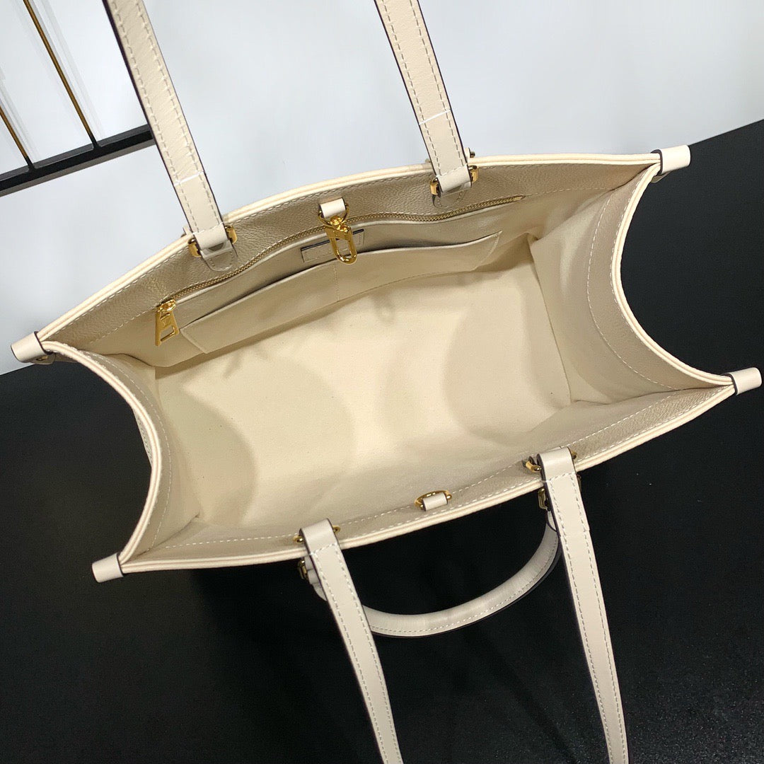 Cream Monogram Empreinte Leather OnTheGo MM