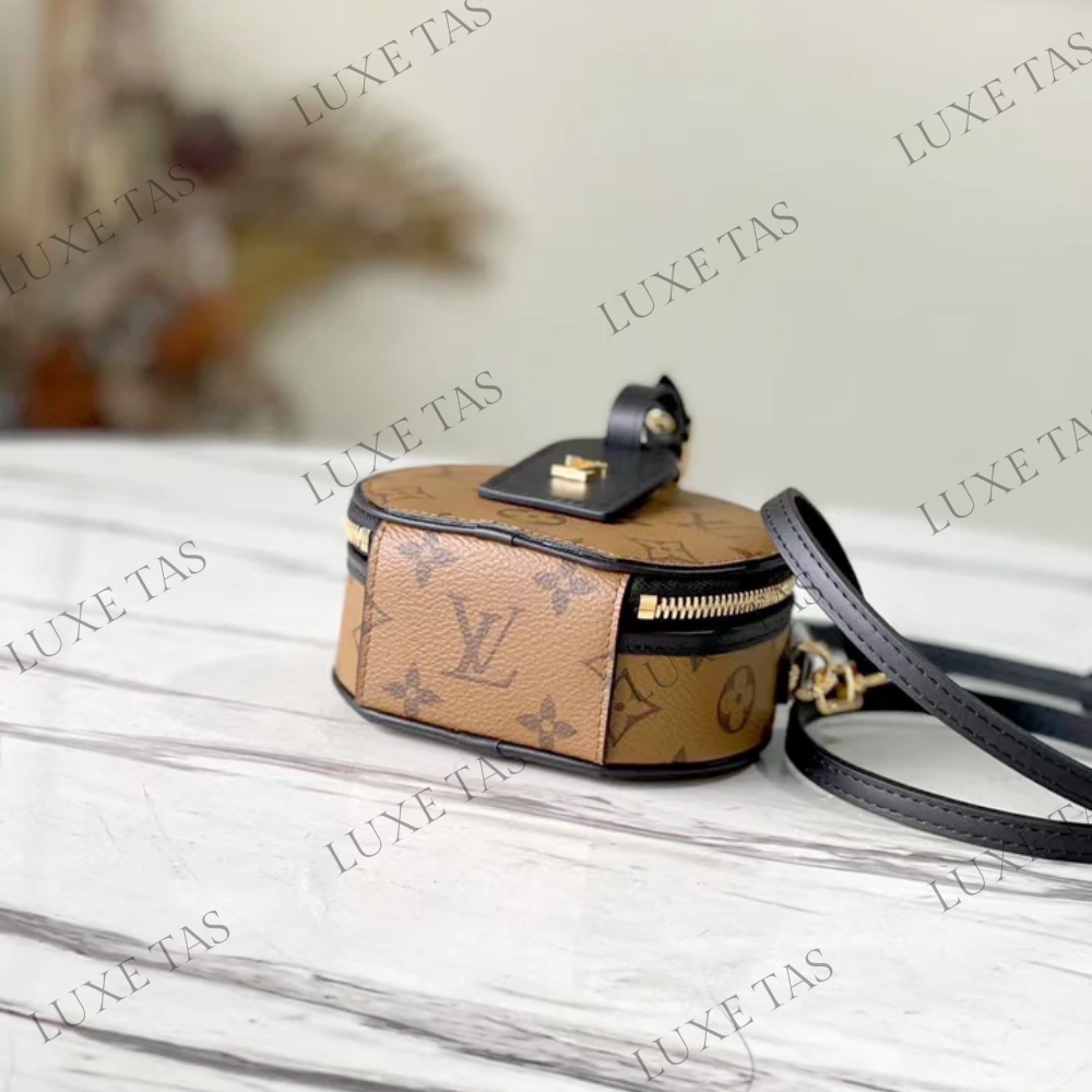 Monogram Reverse Canvas Boîte Chapeau Mini Bag