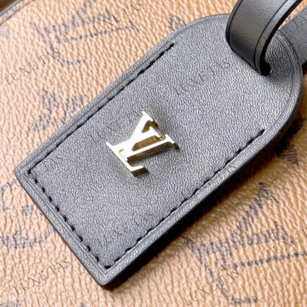 Monogram Reverse Canvas Boîte Chapeau Mini Bag