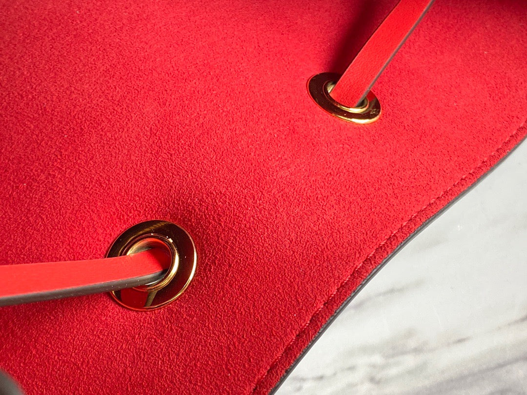 Poppy Monogram NéoNoé MM Beuteltasche aus Leder für Damen