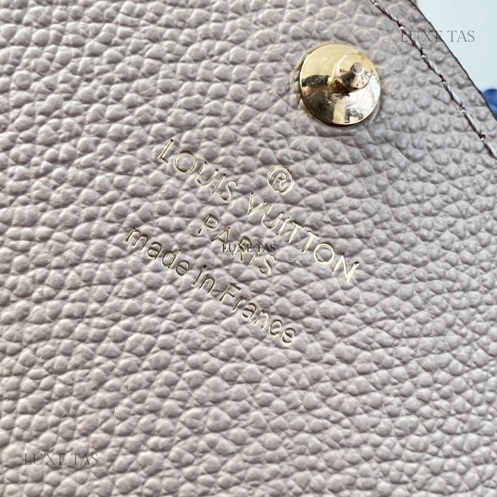 Tourterelle Monogram Empreinte Leather Sarah Wallet