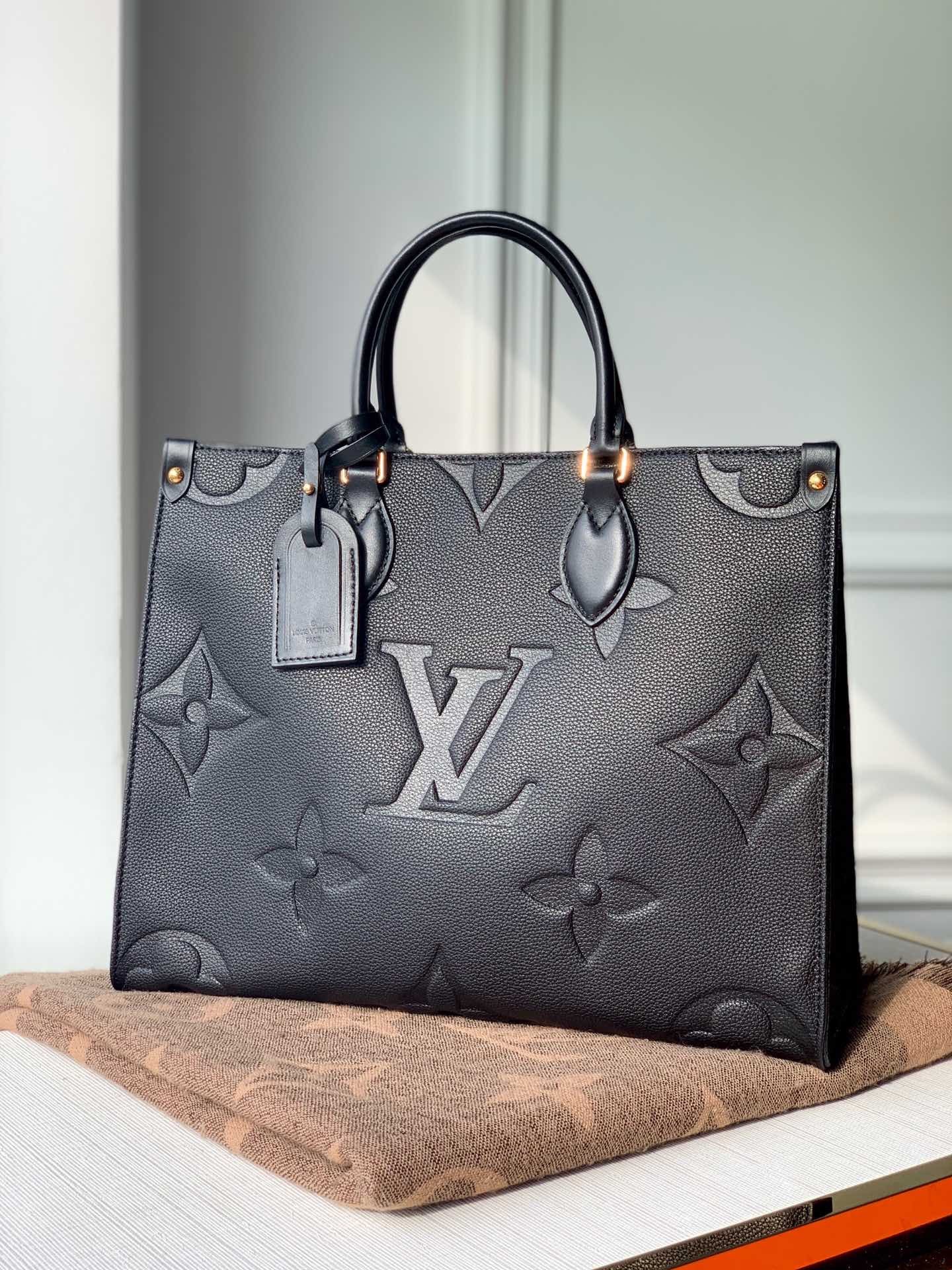 Monogram Empreinte Leather Onthego MM Tote Bag