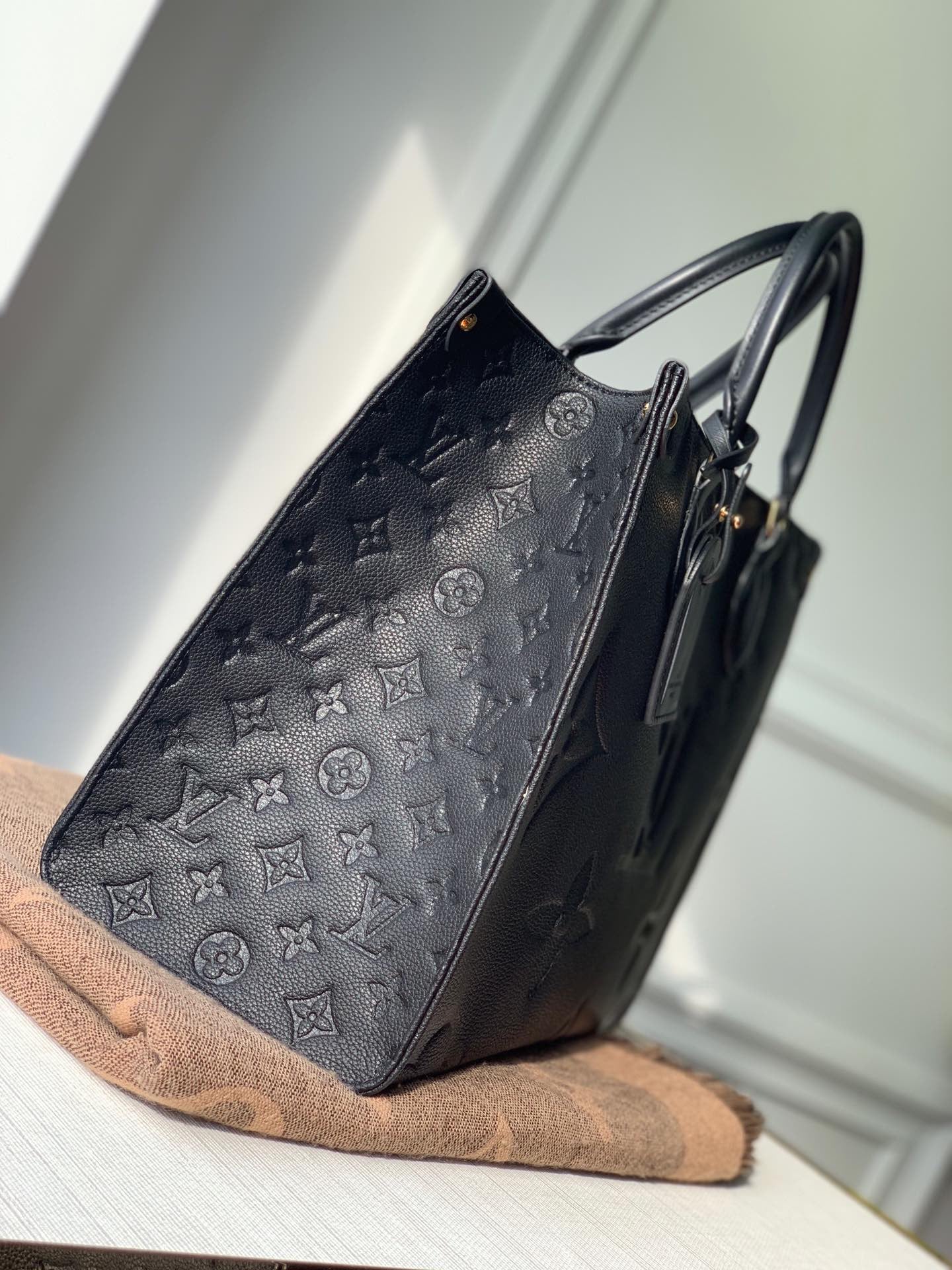 Monogram Empreinte Leather Onthego MM Tote Bag