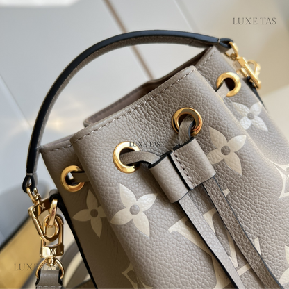 Bicolor Monogram Empreinte Leather Nano Noé - Leather Bucket Bag for Women