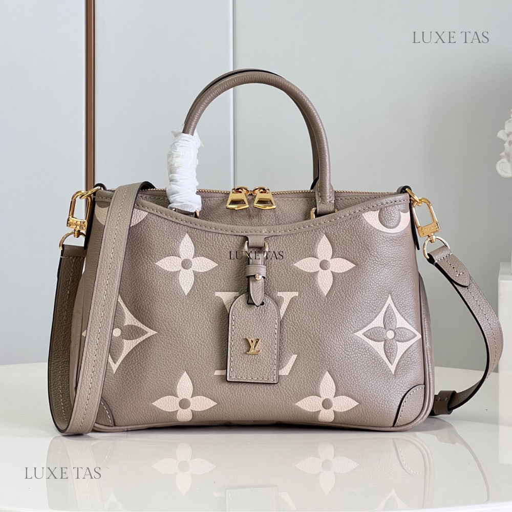 Bicolor Monogram Empreinte Leather Trianon PM - Leather Handbag for Women