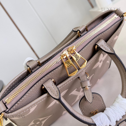 Bicolor Monogram Empreinte Leather Trianon PM - Leather Handbag for Women