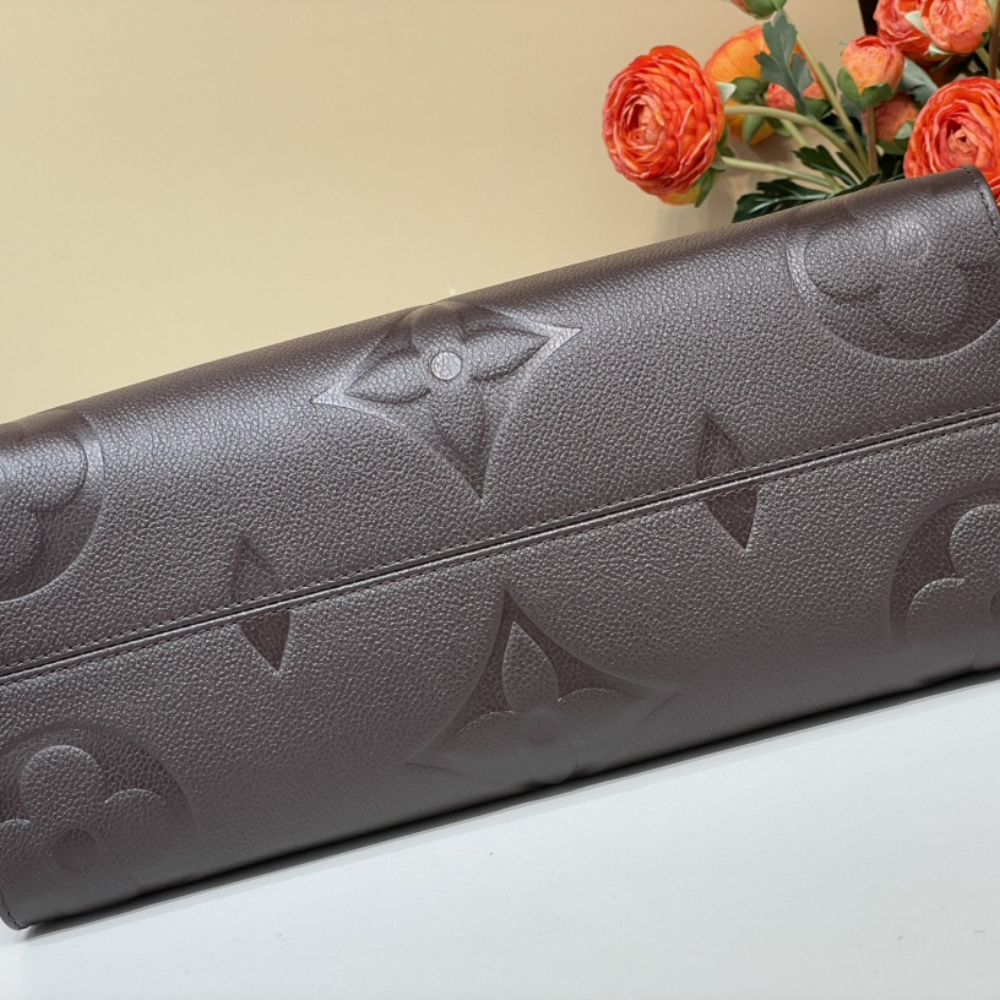 Chocolate Monogram Empreinte Leather OnTheGo MM Leather Tote Bag for Women