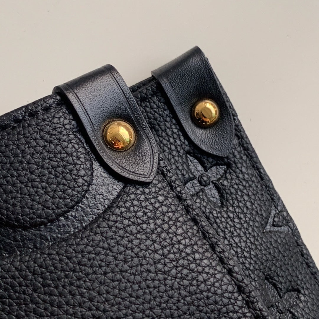 Onthego MM Bicolour Monogram Empreinte Leather - Handbags